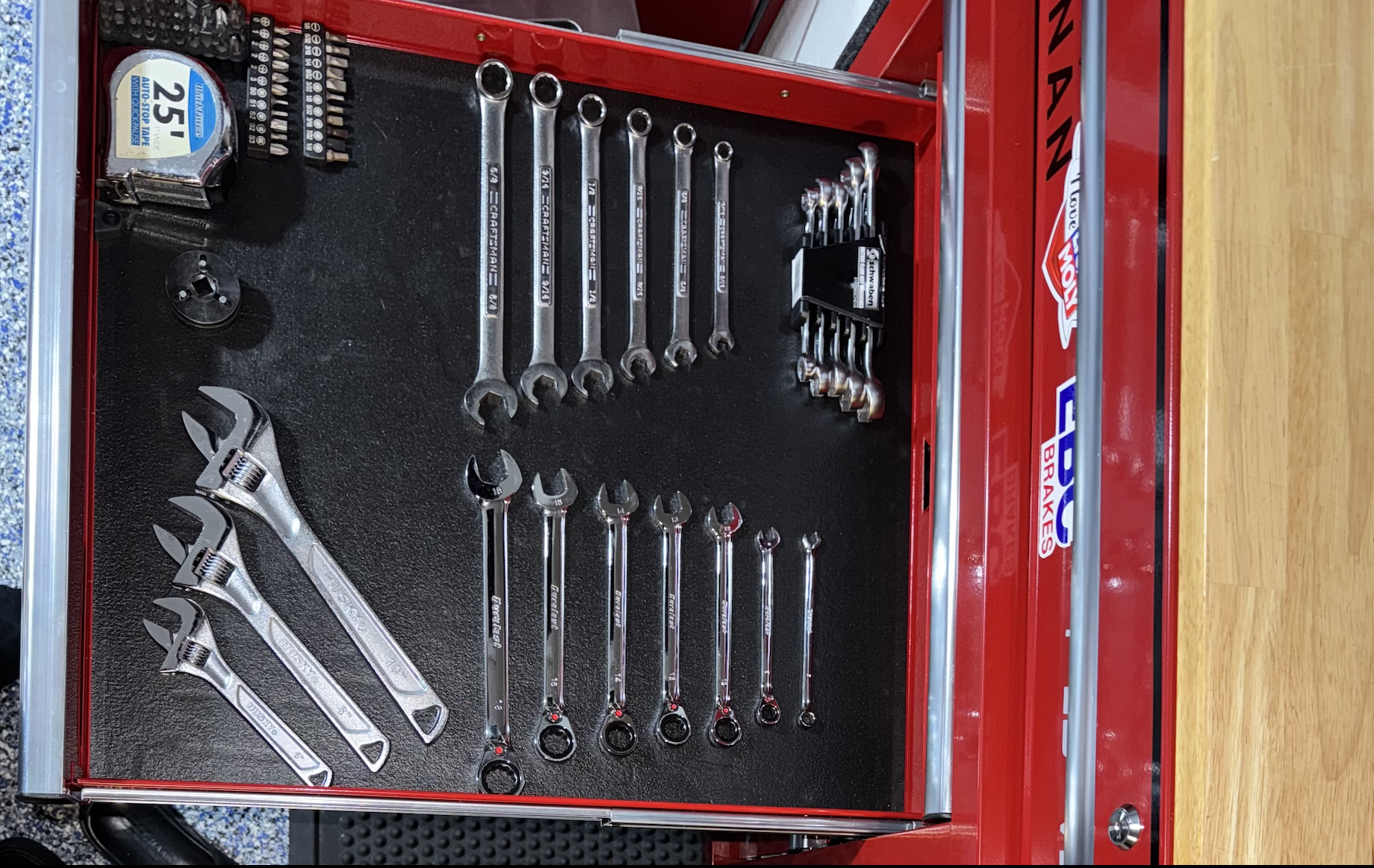 Tool drawer with drill bits and accessories organized